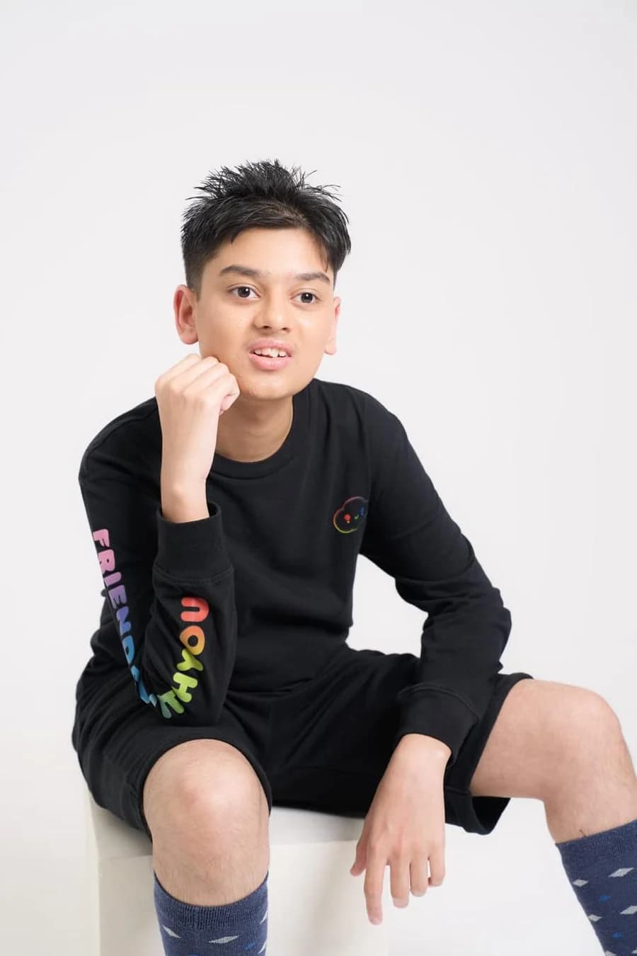 Aarav Trivedi smiling in a studio portrait
